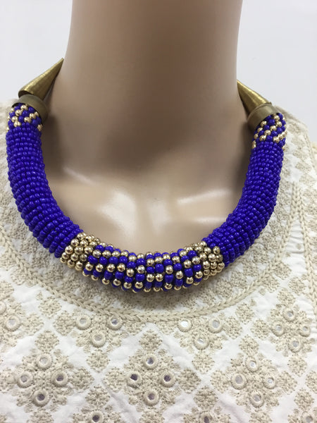 Traditional blue necklace with long ear rings